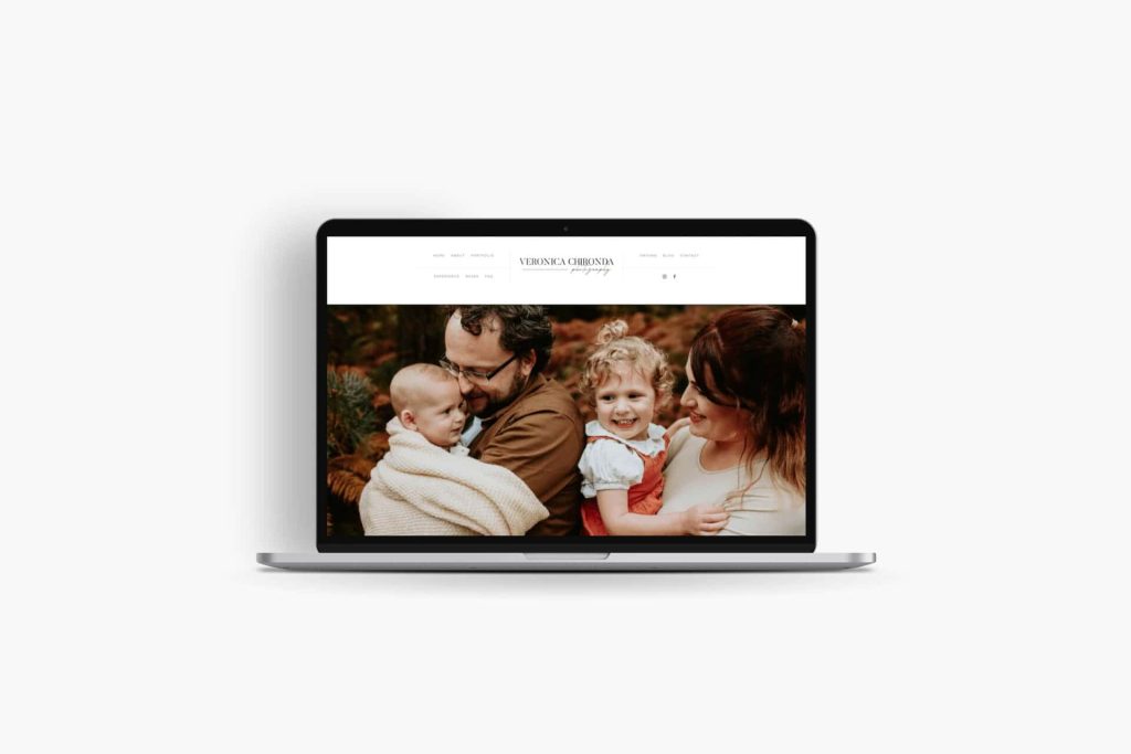 Laptop showing the homepage of a photographer's website, designed by jules Derevycka